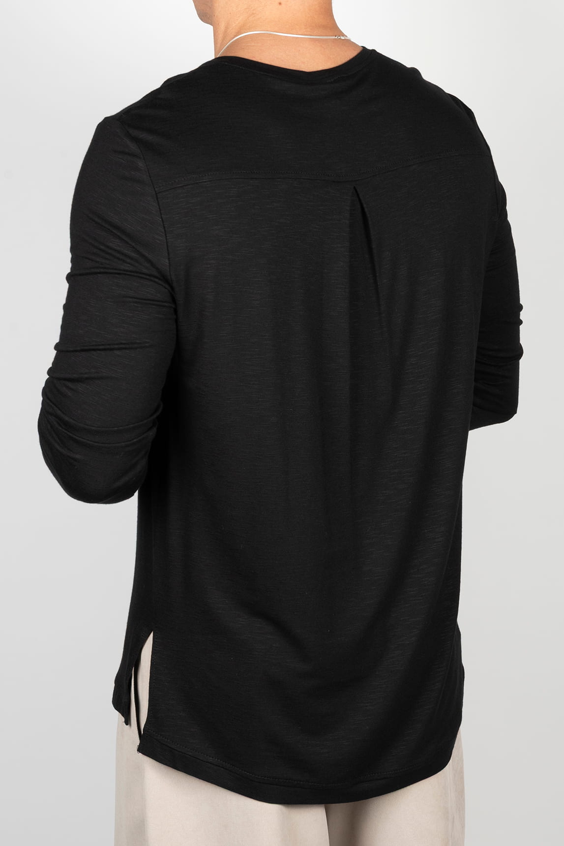 Black long-sleeved t-shirt with pocket