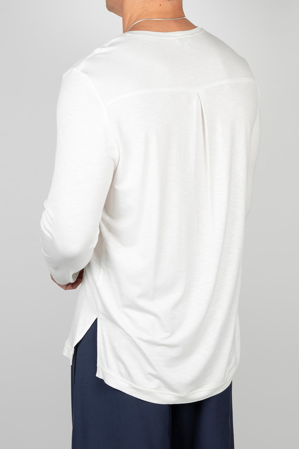 White long-sleeved t-shirt with pocket