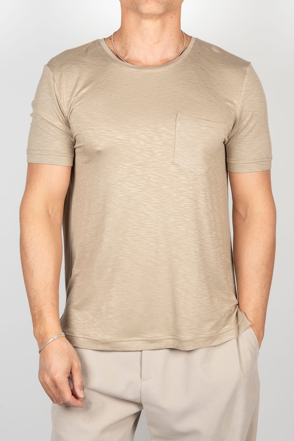 Beige short-sleeved t-shirt with pocket